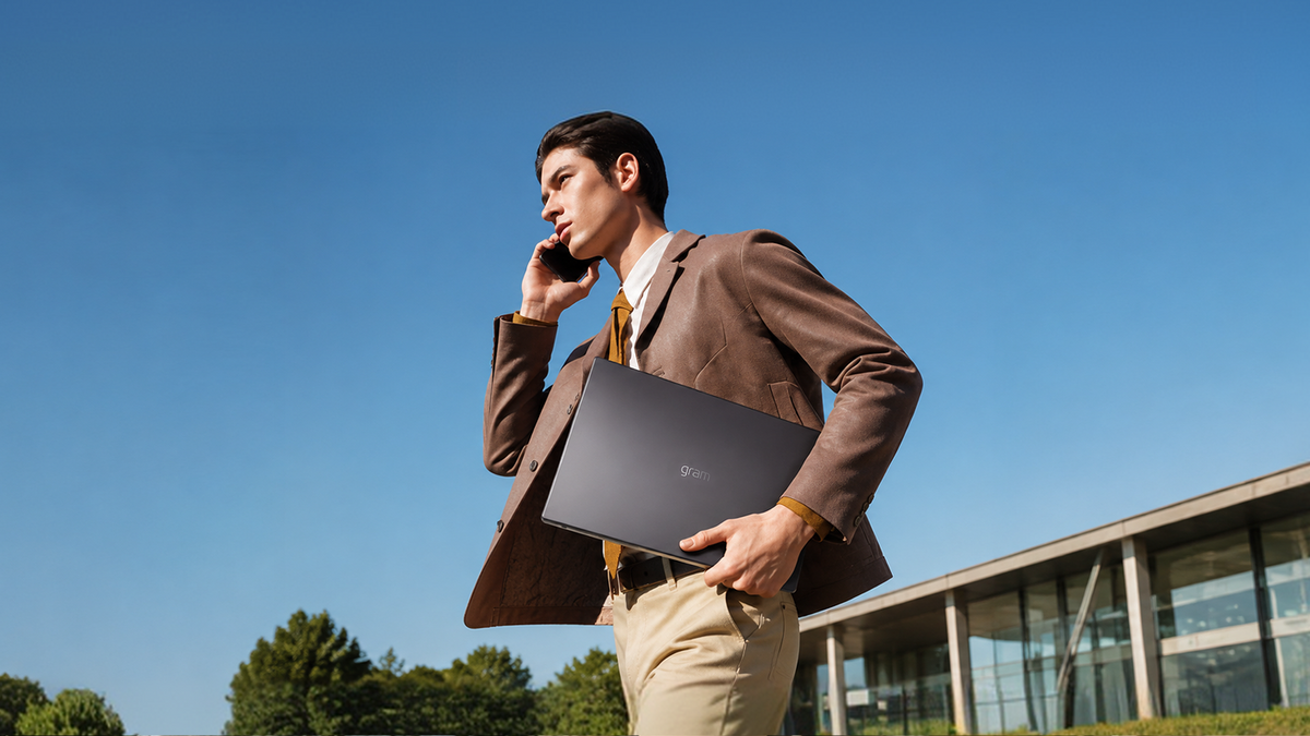 Businessman with an LG gram laptop working outdoors
